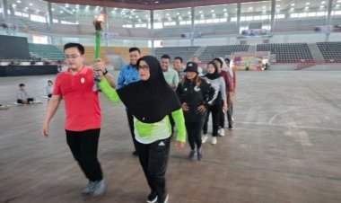 Dahliana dan Heriyanto Pembawa Obor Porprovsu 2022