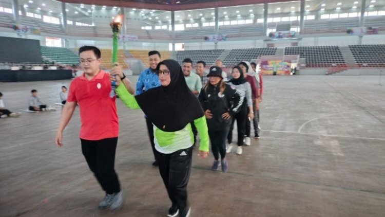 Dahliana dan Heriyanto Pembawa Obor Porprovsu 2022